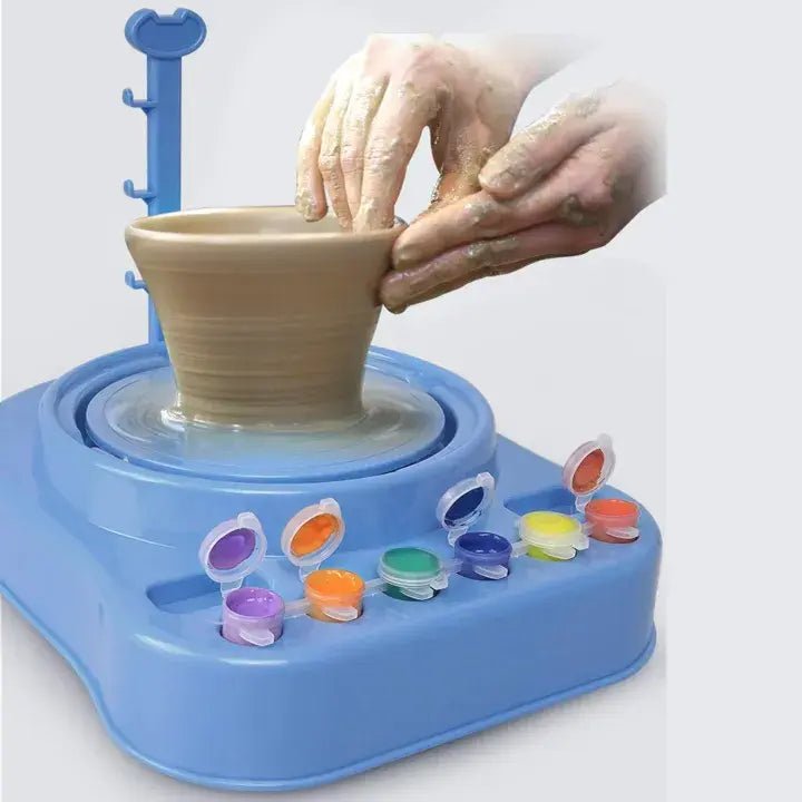 https://cdn.shopify.com/s/files/1/0872/8143/4908/files/Pottery-Painting-Machine-Toynix-108513165.png?v=1753881785