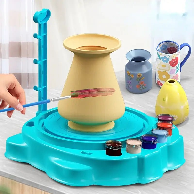 https://cdn.shopify.com/s/files/1/0872/8143/4908/files/Pottery-Painting-Machine-Toynix-108513467.png?v=1753881785