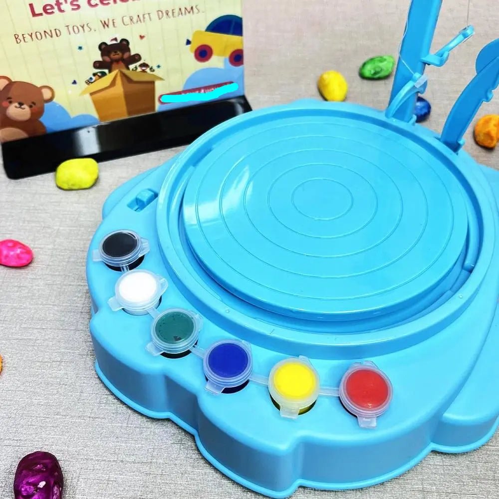 https://cdn.shopify.com/s/files/1/0872/8143/4908/files/Pottery-Painting-Machine-Toynix-108513615.png?v=1753881785